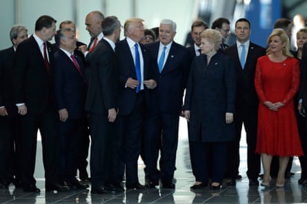 a group of formally dressed people