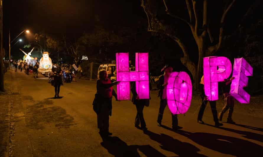 A source of hope and healing: the lantern parade snakes its way through Lismore.