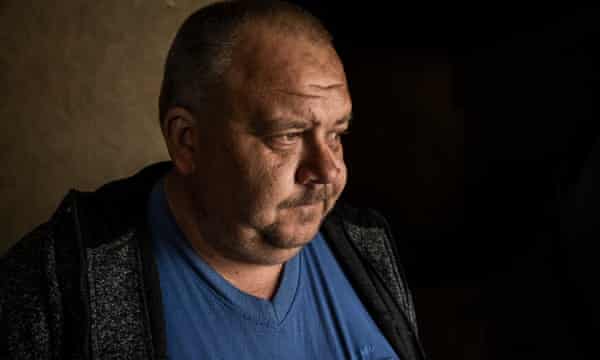 Vitaliy cries inside Kharlamov’s damaged house.