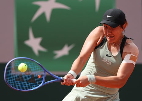 Xiyu Wang powers a backhand to Yuliia Starodubtseva during her straight sets victory.