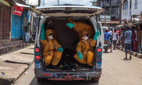 In October 2014, volunteers arrive in Freetown, Sierra Leone, to help with efforts to fight Ebola