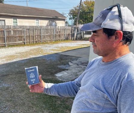 a man holds a passport