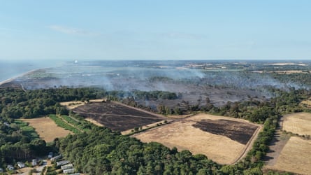 Aerial view of burnt heathland and fields