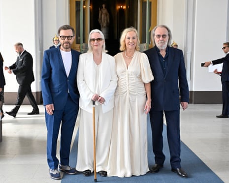 From left: Bjorn Ulvaeus, Anni-Frid Lyngstad, Agnetha Fältskog and Benny Andersson pose for a photo in a large hallway