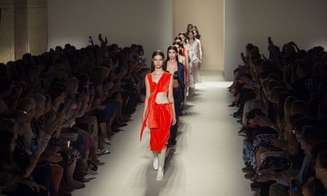 Models present a Victoria Beckham collection during New York fashion week in 2016