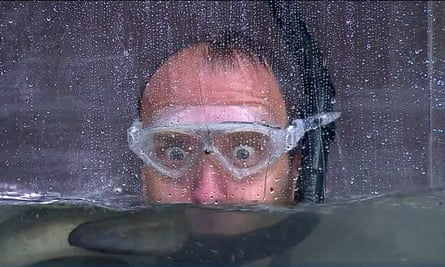 Matt Hancock wearing goggles mostly submerged in water