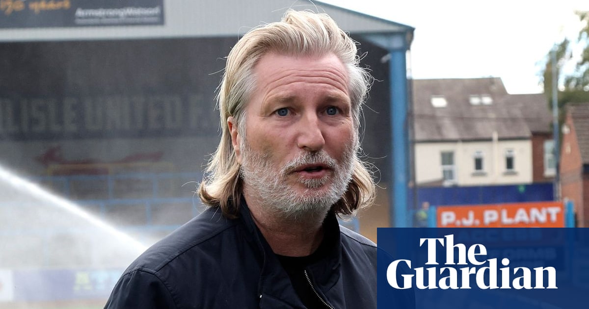 Robbie Savage looks across the pitch during his presentation as the new manager of Peterborough United.