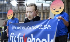 Protesters outside Portcullis House in Westminster before Schroepfer’s appearance.