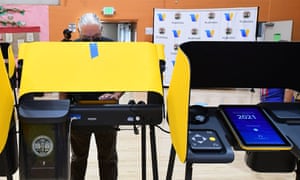 A man casts his vote at the Lincoln Park senior center in Los Angeles, California, ahead of the recall election for Gavin Newsom.