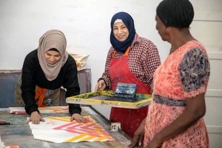 Workers producing screen printed bags in their Cairo workshop, Egypt