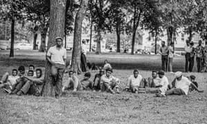 A group of men in Kelly Ingram Park, opposite the 16th Street Baptist Church in Birmingham, Alabama