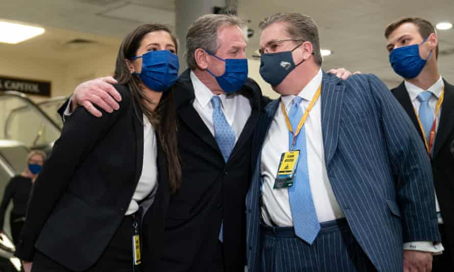 Trump's lawyers celebrate his acquittal.