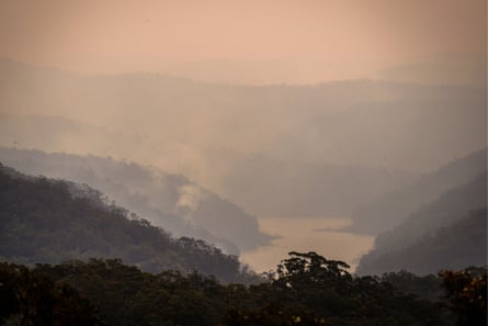 Smoke rises from bushfires in valleys surrounding the Hawkesbury river