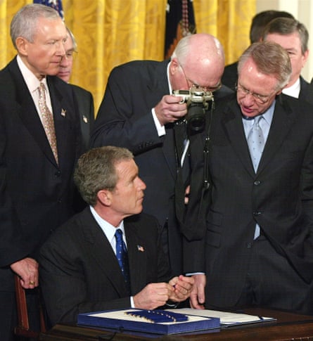 President George W Bush signs the Patriot Act Bill during a ceremony in the White House in 2001. The law gave police unprecedented authority to search people’s homes and business records secretly and eavesdrop on telephone and computer conversations.