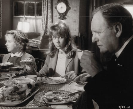 Poole and Mills with Bernard Lee as Mr Bostock in Whistle Down the Wind. Mealtime home scene with food on the table.