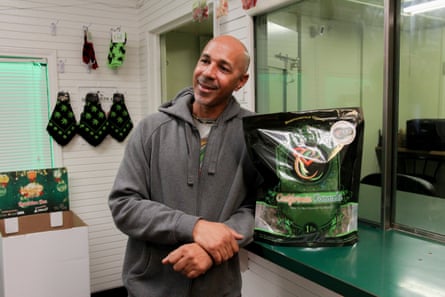 Virgil Grant with a bag of his California Cannabis.