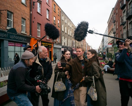 Herzog (second left) directs Rooney and Kate Mara while filming Bucking Fastard.
