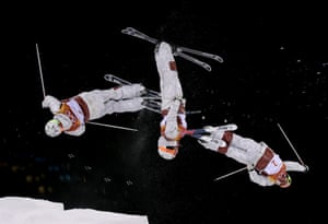 A multiple exposure of Andi Naude, of Canada, during the women’s moguls finals.