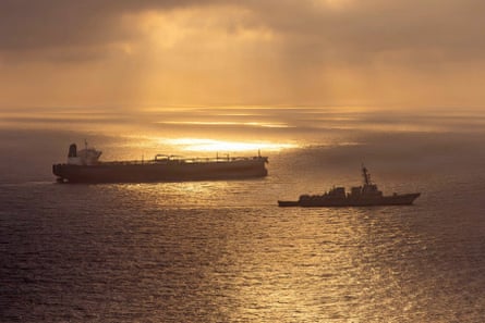two boats at sunset in the sea