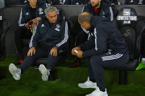 Mourinho warms up for the action to start.