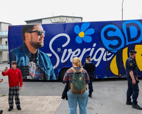 A bus carrying the leader of the far-right party the Sweden Democrats, Jimmy Åkesson, leaves after he cast his vote early ahead of Sunday’s general election in Rinkeby in Stockholm, Sweden.