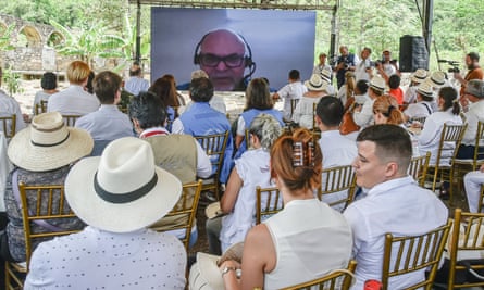 Salvatore Mancuso, former commander of the right-wing paramilitary group AUC, seen on screen during during ceremony where he apologised for his crimes.