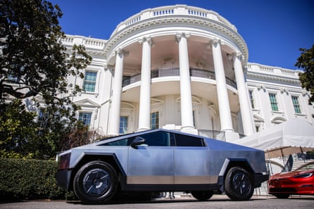 A futuristic-looking truck parked outside of the White House