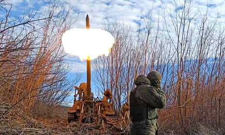 Members of the self-proclaimed Donetsk People's Republic (DPR) fire a howitzer on Bakhmut’s border front in Donetsk.