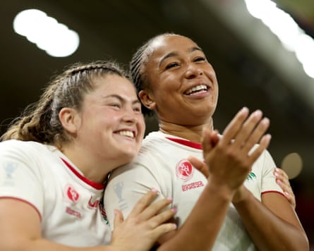 Maud Muir (left) and Sadia Kabeya of England are all smiles after their team’s victory over the USA.