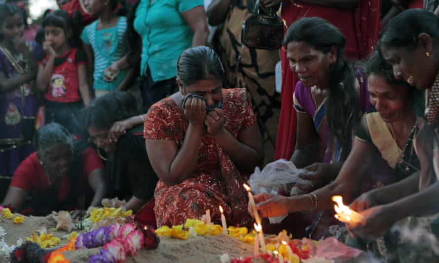 Tamil women in Mullivaikkal crying at a commemoration in 2015