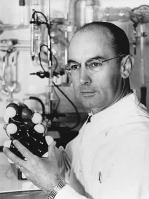Swiss chemist Albert Hofmann in 1943, holding a model of the LSD molecule.