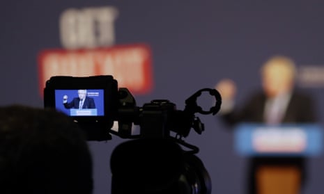 A camera takes images of Boris Johnson during his speech in Telford.