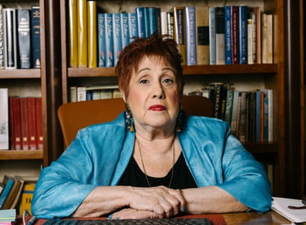 Author and professor of psychology and women’s studies Phyllis Chesler sitting at a desk in front of a bookcase