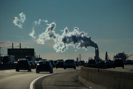 A factory emits smoke in the background of the New Jersey turnpike in November 2017.