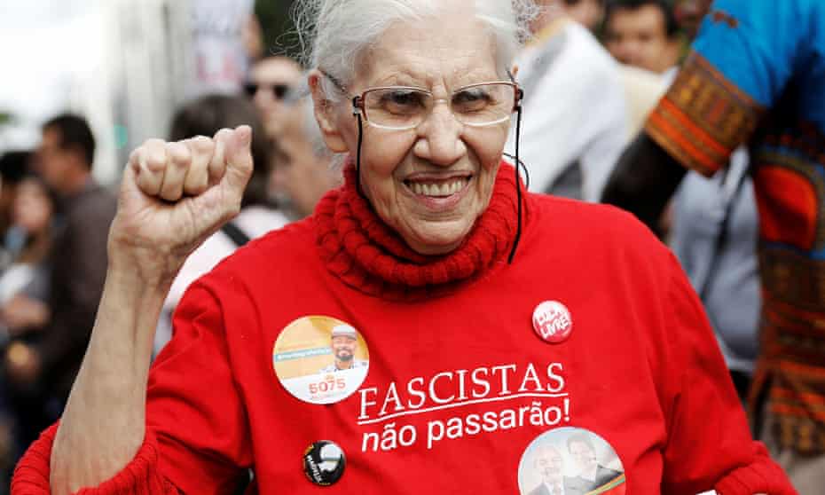 A supporter of presidential candidate Fernando Haddad of the Workers’ party gestures as she wears a T-shirt that reads: ‘Fascists shall not pass’.