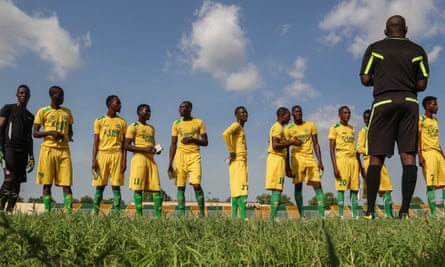 The El-Kanemi Warriors, the local football team, prepare to play after years kept off the pitch due to security concerns.