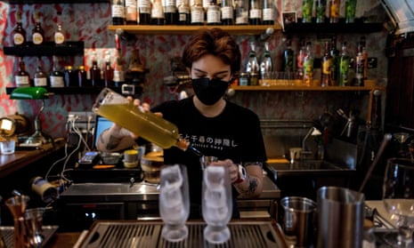 A bartender making kratom-infused mocktails at the Teens of Thailand cocktail bar in Bangkok