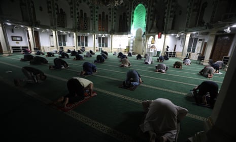 People pray while observing social distancing at the Al Emam Aly Mosque in Cairo, Egypt today. Mosques in Egypt reopened with safety guidelines such as limited capacity, the use of personal prayer mats and temperature screening.