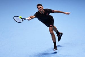 Roger Federer of Switzerland stretches to play a forehand.