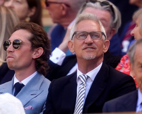 Gary Lineker, wearing a striped tie and smart jacket, in the Royal Box at Wimbledon.