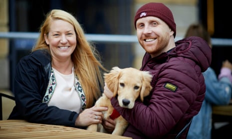 Lucy Andrews and Paul Swann with their dog in Stockport