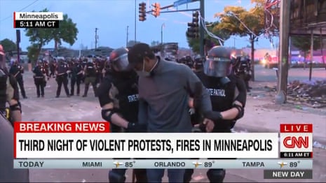 CNN journalists arrested live on air while covering George Floyd protests – video
