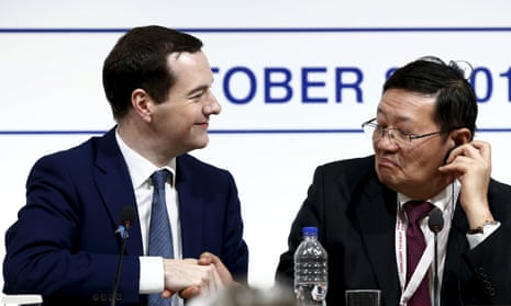 George Osborne, left, and Lou Jiwei of China attend a finance ministers’ meeting in Lima, Peru.