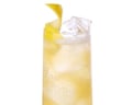 Eleanore Edinburgh's apple highball. A tall glass of bubbly apple cocktail with ice and a lemon twist garnish
