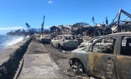 Burned cars and destroyed buildings in Lahaina, western Maui, Hawaii on Saturday.