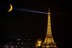 The moon is pictured with the Olympic cauldron and the Eiffel Tower, 9 August 2024