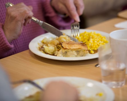 A person eating dinner