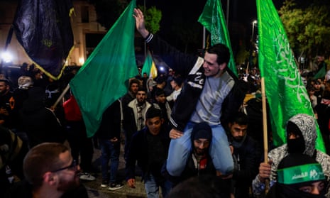 A freed Palestinian reacts after arriving in the West Bank city of Ramallah