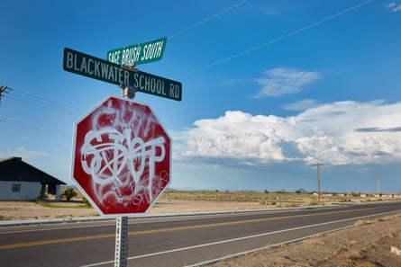 Stop sign covered in graffiti, Blackwater, Arizona