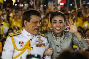 Bangkok, ThailandThailand’s King Maha Vajiralongkorn and Queen Suthida wave to supporters outside the Grand Palace after presiding over a religious ceremony at a Buddhist temple inside the palace